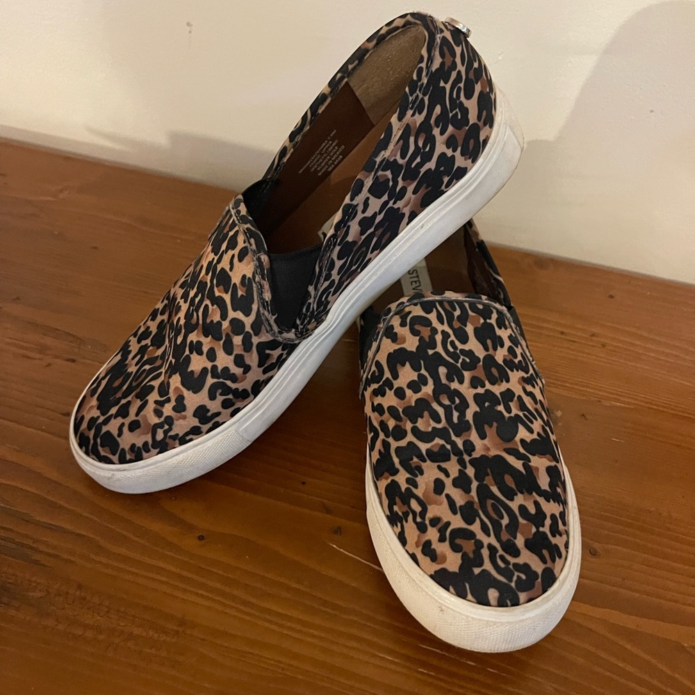 Steve Madden slip on shoes.